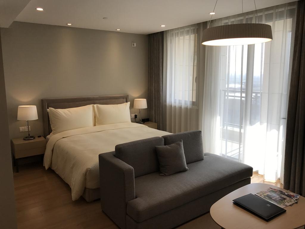 One Sunland Serviced Suites Managed By Lanson Place Σανγκάη Δωμάτιο φωτογραφία
